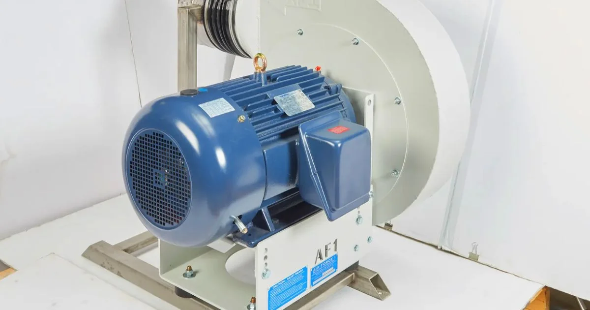 Industrial direct-drive blower system on metal stand.