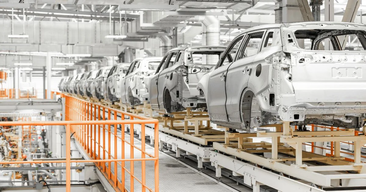 Automotive assembly line with car bodies.